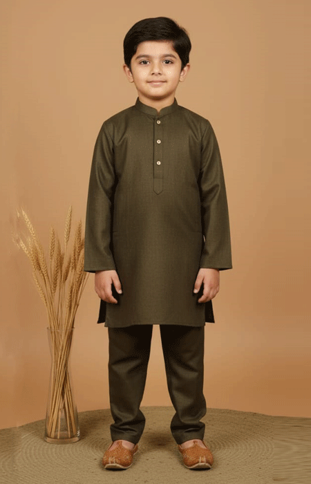 Olive Green Boys Kurta Pajama Olive Green Boys Kurta Pajama Set – front view showing a young boy standing straight wearing a simple olive green kurta and pajama with brown traditional shoes.