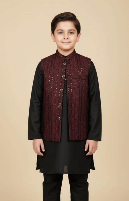 Boys Maroon Embroidered Waistcoat Front view of a Boys Maroon Embroidered Waistcoat styled over a black kurta pajama, featuring elegant threadwork and button detailing.